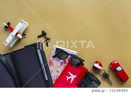 Men's travel accessories, devices, coffee on camel background. , Top view, flat lay and copy space Men's travel accessories, devices, coffee on camel background. , Top view, flat lay and copy space 73146404