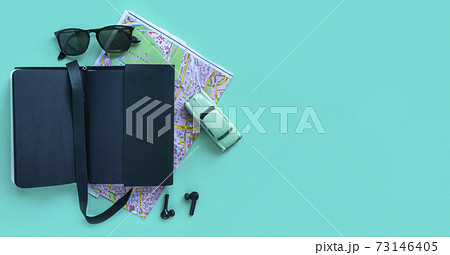 Fashion men accessories and devices on turquoise background. View from top, Flat lay and copy space 73146405