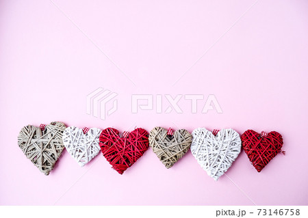 Valentine hearts on pink background with copy space. Symbols of love in shape of heart for Happy Valentine's , Women's, Mother's Day, birthday. Valentine hearts on pink background with copy space. Symbols of love in shape of heart for Happy Valentine's , Women's, Mother's Day, birthday. 73146758