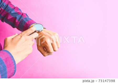 Man wear smart watch in everyday lifestyle. Man wear smart watch in everyday lifestyle. 73147398