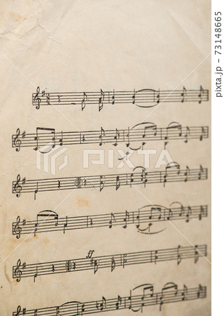 The work of the Uzbek folk composer. Vintage sheet of paper with handwritten musical notes The work of the Uzbek folk composer. Vintage sheet of paper with handwritten musical notes 73148665