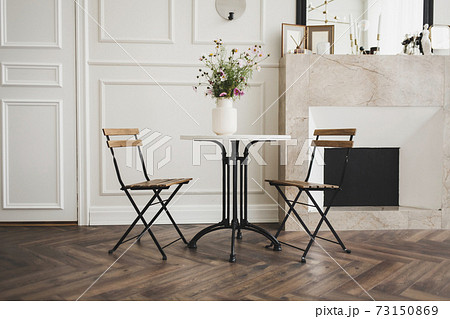 spacious living room with a classic table spacious living room with a classic table 73150869
