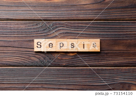Sepsis word written on wood block. Sepsis text on cement table for your desing, concept Sepsis word written on wood block. Sepsis text on cement table for your desing, concept 73154110