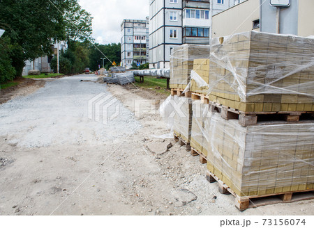 stacks of paving slabs prepared for laying 73156074