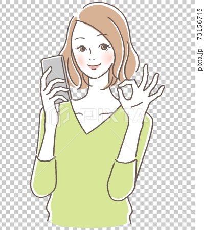 A woman holding a smartphone and giving an OK sign 73156745