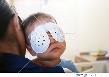 Babies undergoing eye surgery. Babies undergoing eye surgery. 73160586