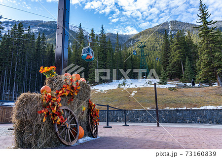 Banff Gondola station in early winter time during the Halloween event. Banff National Park, Canadian Rockies. Banff, AB, Canada 73160839