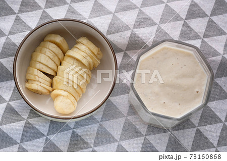 glass of milk and banana on table at morning glass of milk and banana on table at morning 73160868