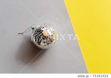 Disco balls on blue background 73161033
