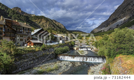 River fall at Cervieres village, Alps mountains, France River fall at Cervieres village, Alps mountains, France 73162444