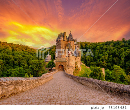 Burg Eltz castle in Rhineland-Palatinate at sunset Burg Eltz castle in Rhineland-Palatinate at sunset 73163481