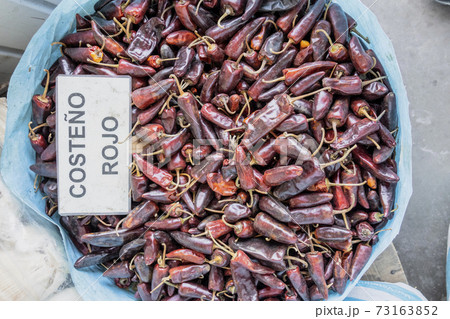 Red Costeno Chili in a pile ready for sale 73163852