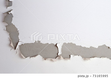 White color paint peeling off on ceiling house. Under the roof White color paint peeling off on ceiling house. Under the roof 73165995