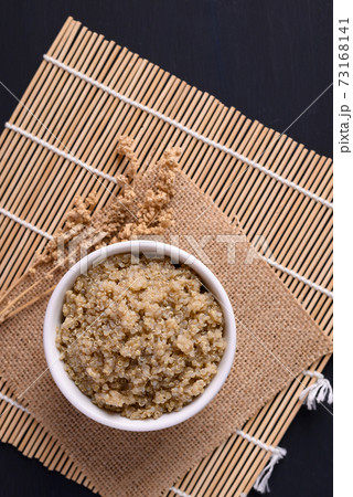 Cooked brown quinoa seeds in a bowl, Healthy vegan food Cooked brown quinoa seeds in a bowl, Healthy vegan food 73168141