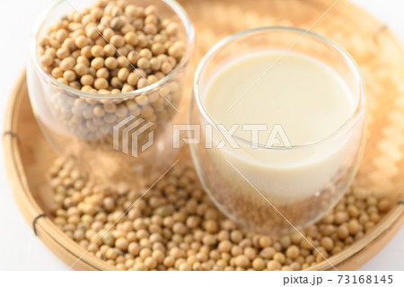 Soy milk and soy beans in a glass, Healthy drink 73168145
