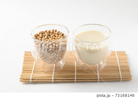Soybeans seed and soy milk in a glass, Healthy drink 73168146