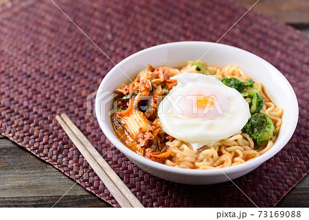 Korean food, Spicy noodles soup with kimchi and egg Korean food, Spicy noodles soup with kimchi and egg 73169088