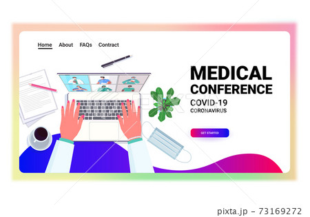 hands using laptop doctor discussing with mix race colleagues on screen doctors having medical conference 73169272
