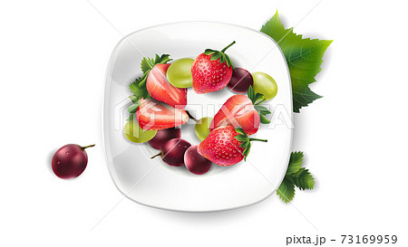 Strawberry and grapes on a white plate. Strawberry and grapes on a white plate. 73169959