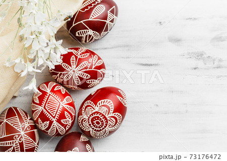 Black colored Easter eggs. Pysanka on white 73176472