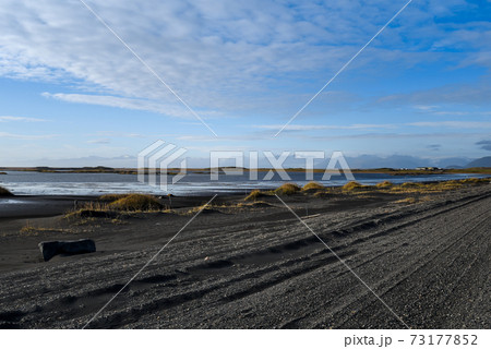 Road and landscape near Stokksness, Iceland 73177852