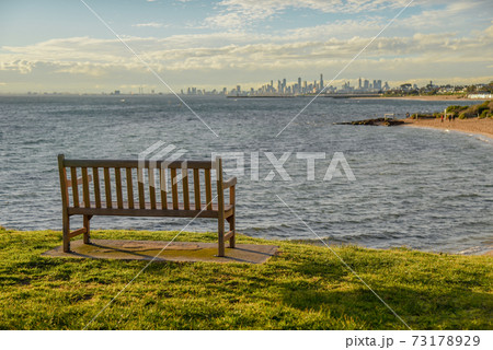 Wooden bench near Brighton beach, Melbourne Wooden bench near Brighton beach, Melbourne 73178929