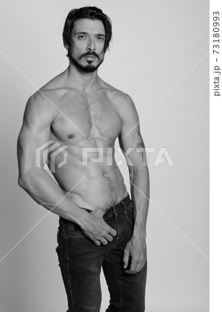 Portrait of handsome man shot in black and white 73180993