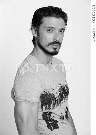 Portrait of handsome man shot in black and white Portrait of handsome man shot in black and white 73181015