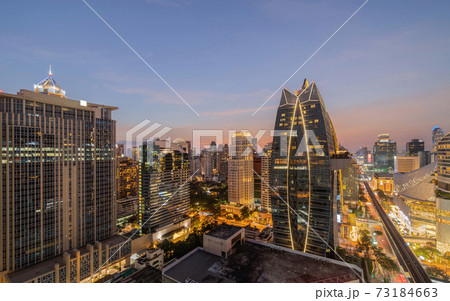 Aerial view of Ploenchit, Bangkok Downtown at night. Financial district and business centers in smart urban city in Asia. Skyscraper and high-rise buildings. Thailand 73184663