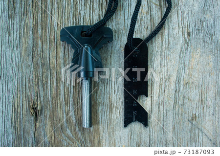 Flames on a wooden background 73187093