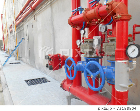 SERDANG, MALAYSIA -JULY 27, 2017: Alarm valve system. It was part of the building fire fighting system which is control and supply water to the sprinkler. 73188804