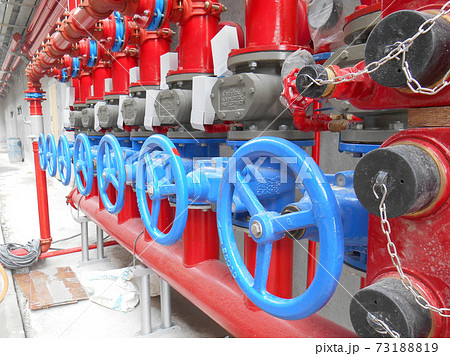 SERDANG, MALAYSIA -JULY 27, 2017: Alarm valve system. It was part of the building fire fighting system which is control and supply water to the sprinkler. 73188819