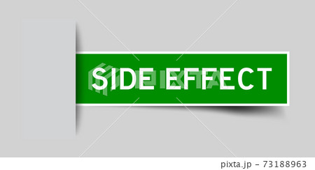 Inserted green color sticker label with word side effect on gray background 73188963
