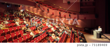 Business speaker giving a talk in conference hall. Business speaker giving a talk in conference hall. 73189469