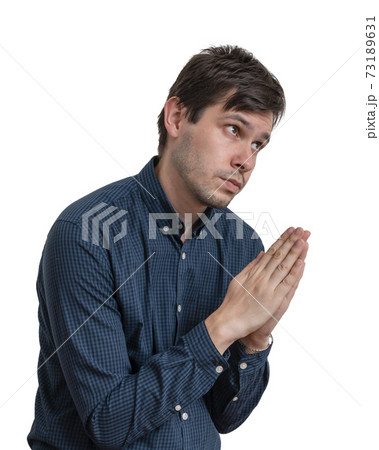 Sad man is begging and asking for help. Isolated on white backgr 73189631