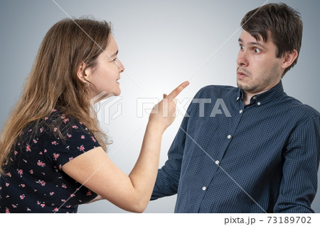 Jealousy hysterical wife is shouting and blaming her husband. Jealousy hysterical wife is shouting and blaming her husband. 73189702