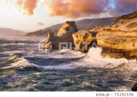 Rough stormy seas on the rocky shore with big scary waves. Rough stormy seas on the rocky shore with big scary waves. 73191556