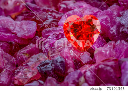 Red heart shaped diamond on pink stones Red heart shaped diamond on pink stones 73191563