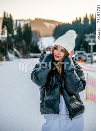 Portrait of Beautiful Cheerful Caucasian Girl On Ski Resort at Winter Portrait of Beautiful Cheerful Caucasian Girl On Ski Resort at Winter 73192785