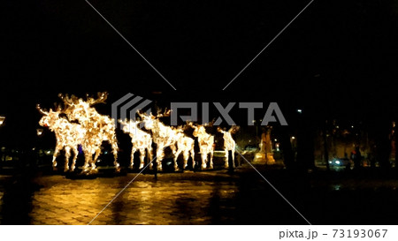 Luminous moose trotting at night on the street in Scandinavia in digital painting style 73193067