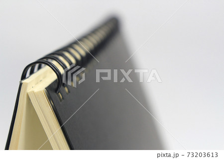 book with ring spine on white background book with ring spine on white background 73203613