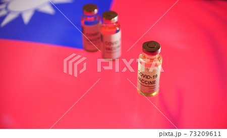 Vials with COVID-19 vaccine and flag of Taiwan Vials with COVID-19 vaccine and flag of Taiwan 73209611