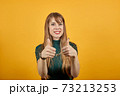 Showing thumbs up, like sign Positive something good happened finger gesture 73213253