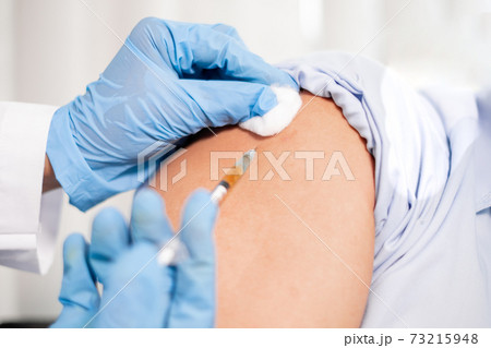 Female doctors vaccinated with syringes to prevent epidemics at hospitals, health care, and medical concepts Female doctors vaccinated with syringes to prevent epidemics at hospitals, health care, and medical concepts 73215948