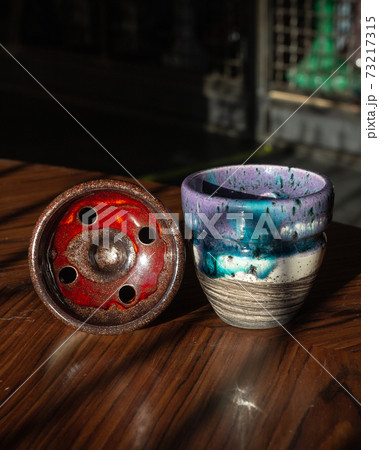 part of the hookah, modern design, on a background. part of the hookah, modern design, on a background. 73217315