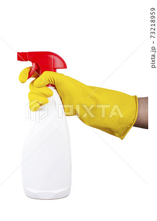 Cleaning concept - woman hand in yellow rubber protective gloves hold cleaning agent bottle 73218959