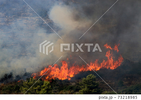 a United Nations helicopter extinguishes a fire on the Israel-Lebanon border a United Nations helicopter extinguishes a fire on the Israel-Lebanon border 73218985