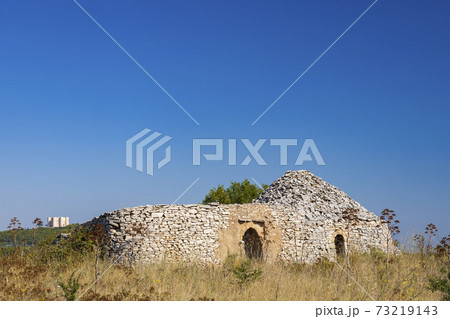 Trulli, typical houses near Castel del Monte, Apulia region, Italy 73219143