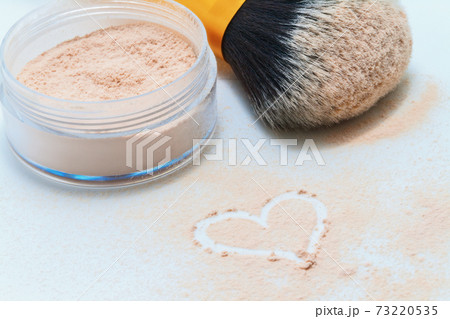 sprinkled powder, brush and drawing heart sprinkled powder, brush and drawing heart 73220535