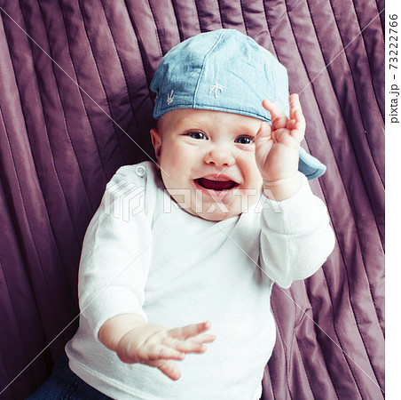 little cute redhead todler in hat happy smiling, lifestyle people concept 73222766